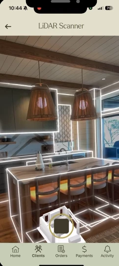 A phone screen shows the LiDAR Scanner app mid-scan, overlaying a glowing wireframe onto a real kitchen with pendant lights and a waterfall-edge island.